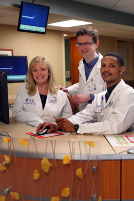 Jane Ballard RN Ryan Genzink physician assistant and Carlos Merritt ACP Member of Hospitalists of West Michigan